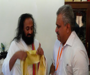 Felicitated by Sri Sri Ravishankar